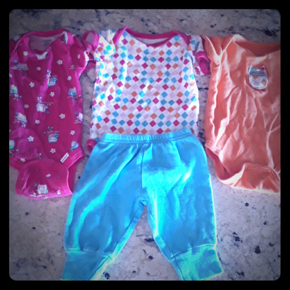 3 onsies and 1 pair of pants